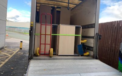 moving office equipment in van